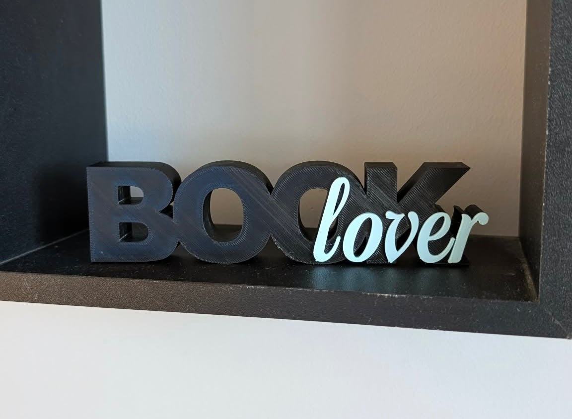 Skylt - Book Lover