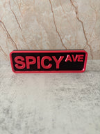 Skylt - Spicy
